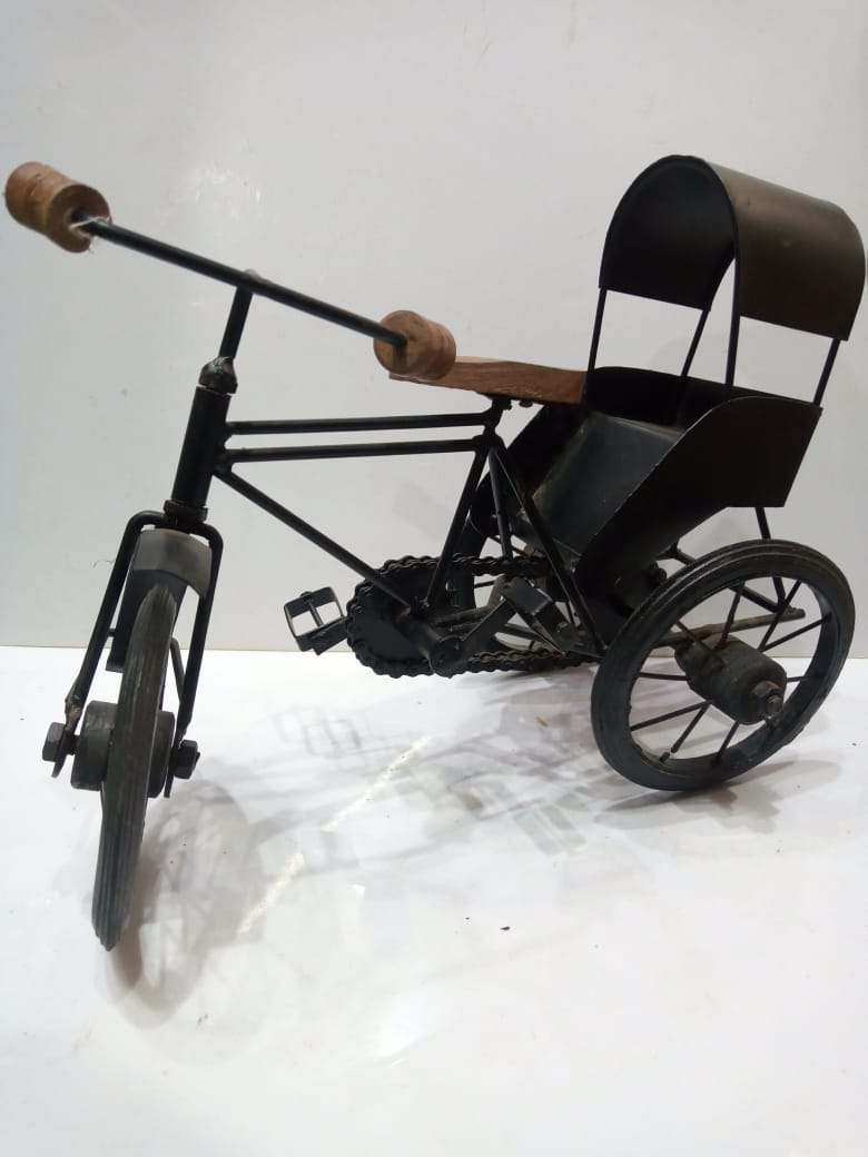 Elegance in Miniature: The Metallic Rickshaw Showpiece